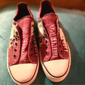 Ed Hardy shoes. Slip on. Never worn size 6. Perfect condition